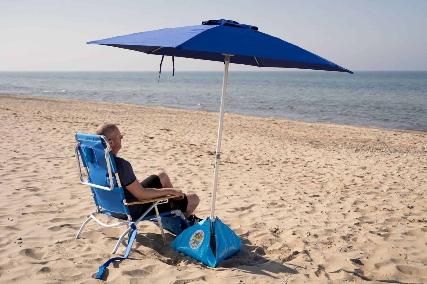 Beach Umbrella Torben Sitting On Beach Chair