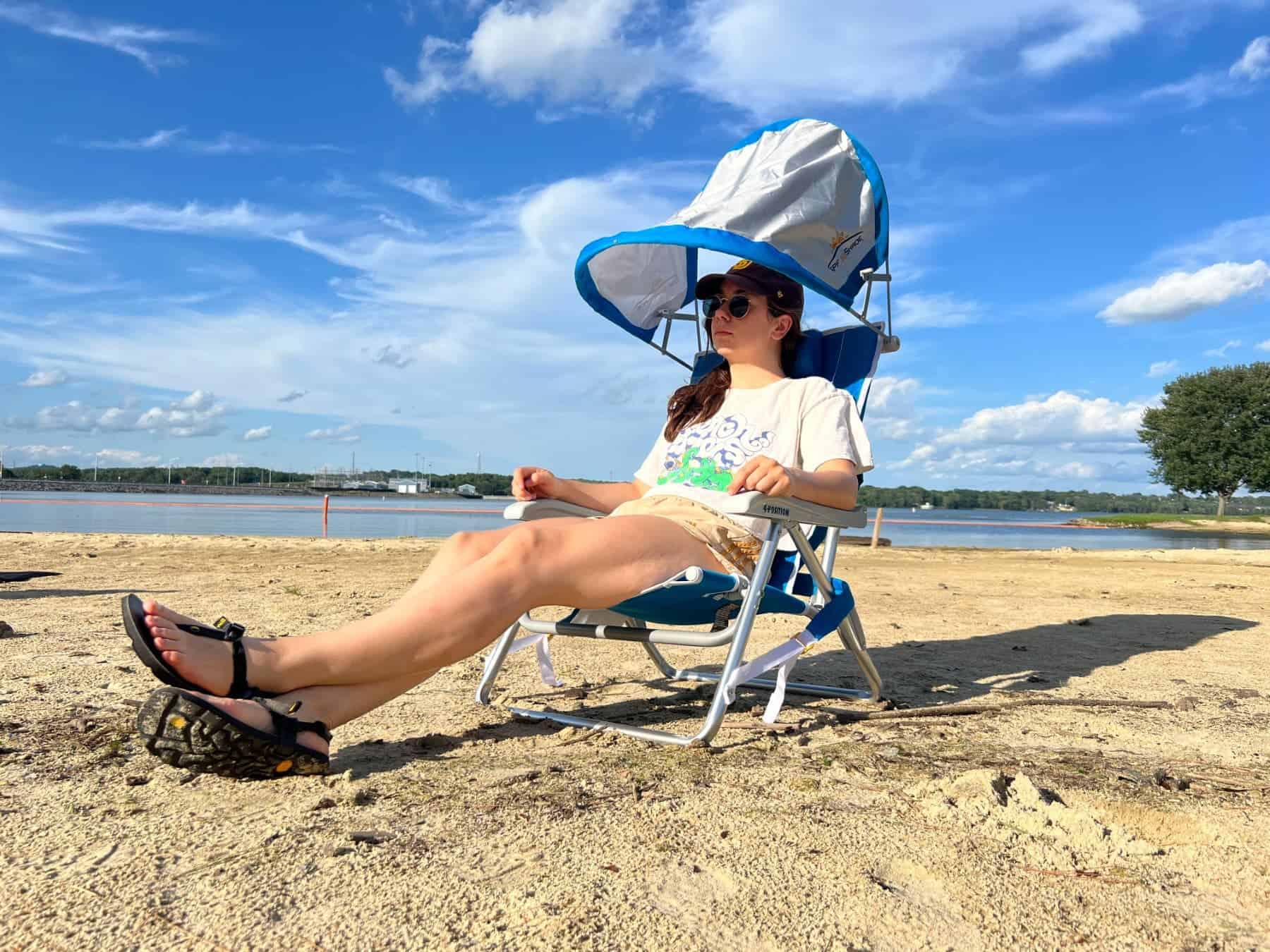 Gci Outdoor Portable Beach Chair Woman Sitting With Shade On