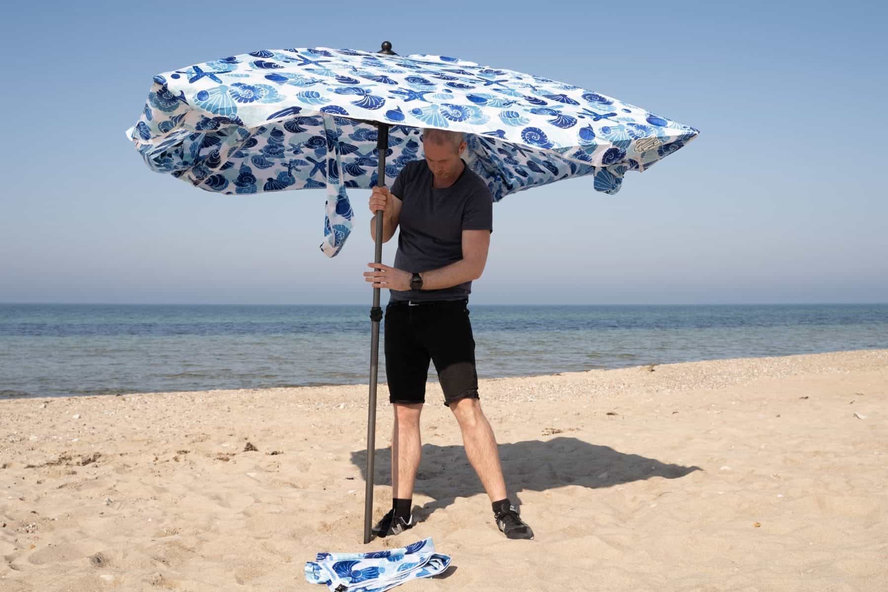 qipi-beach-cabana-torben-under-umbrella