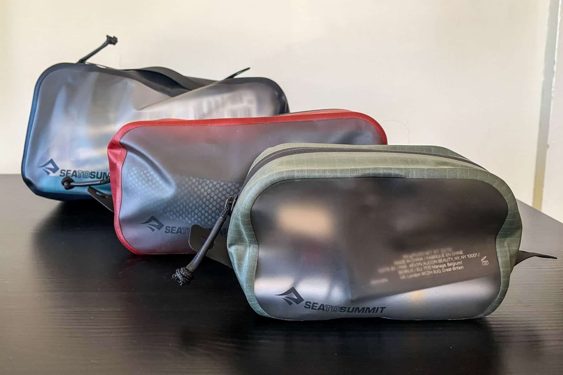 Sea to Summit Hydraulic pack set. Three packing cubes in sizes XS, S, and M .